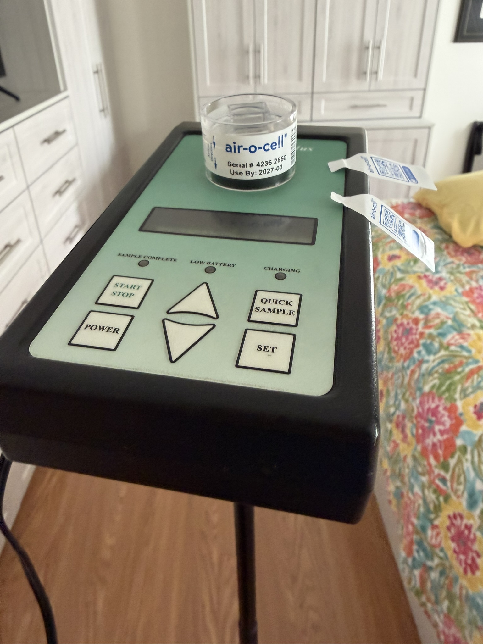Air sampling pump with Air-O-Cell cassette collecting mold spore samples