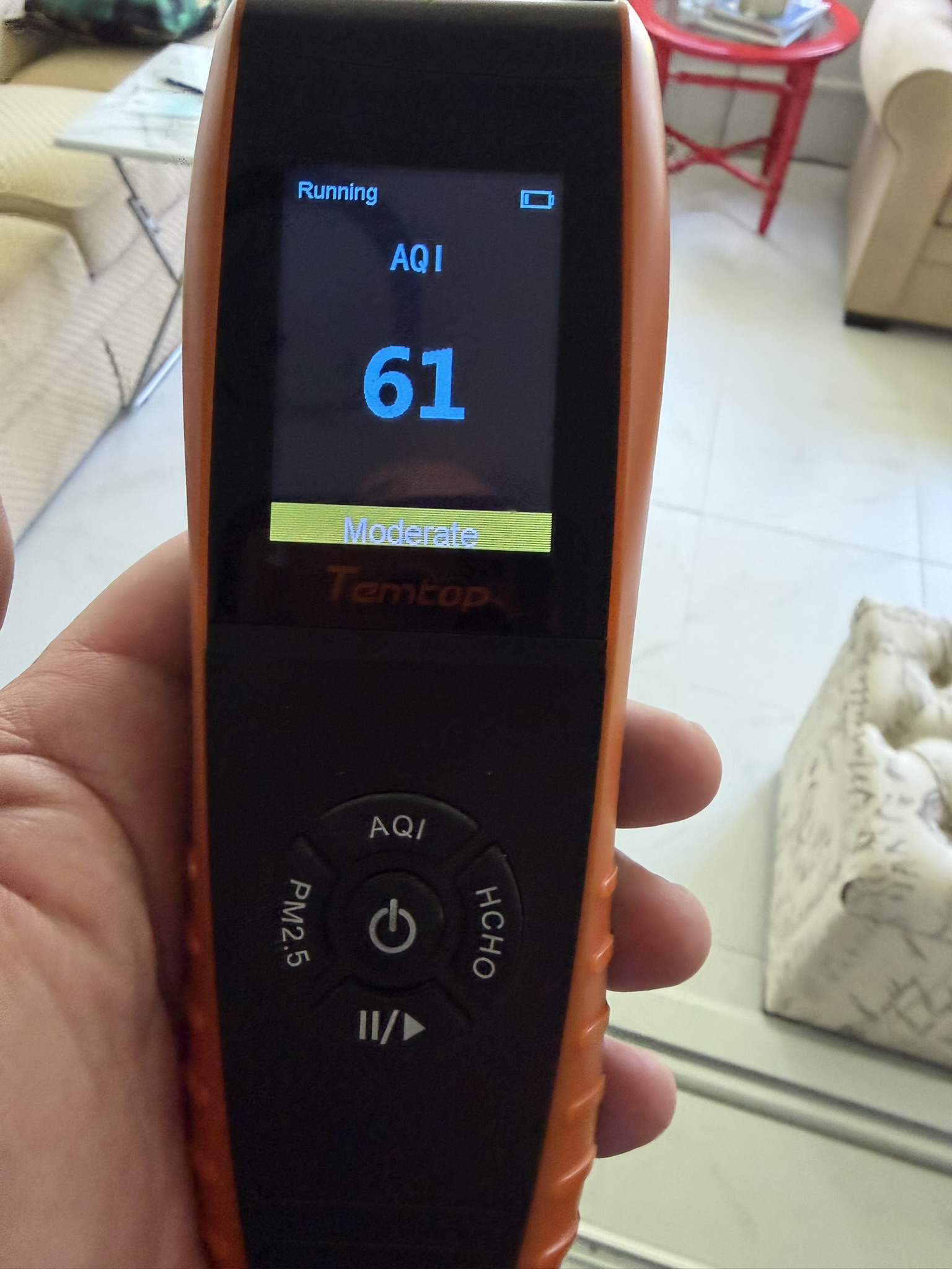 Temtop air quality monitor showing AQI reading